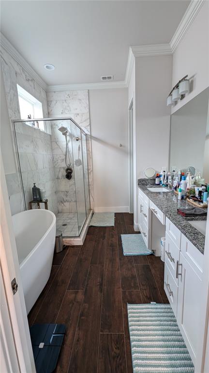 7476 Southwest 66th Lane Gainesville, FL 32608 - Photo 8 of 21 a bathroom with a sink a toilet a mirror and shower