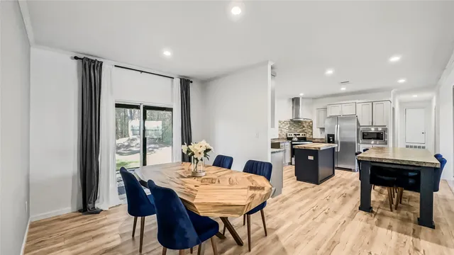 a view of a dining room with furniture