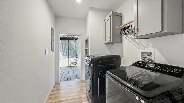 a kitchen with stainless steel appliances granite countertop a stove and a refrigerator