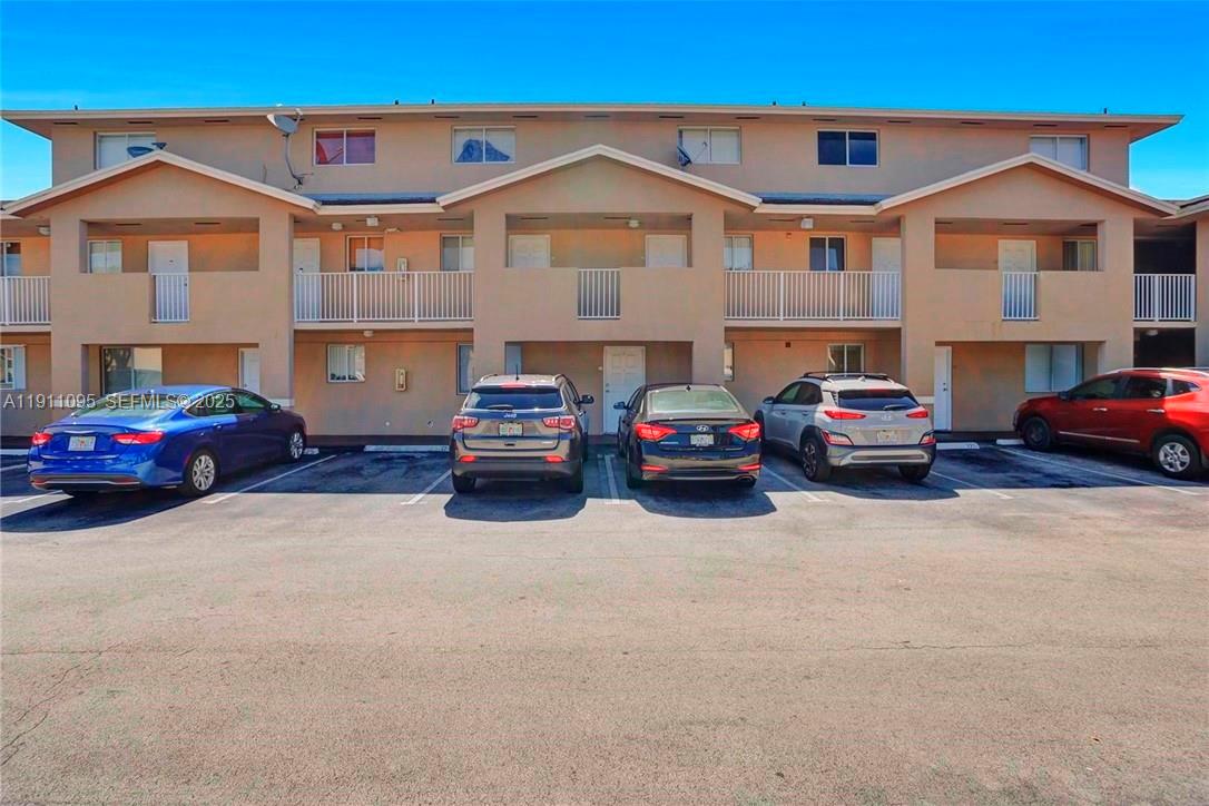 7755 West 30th Court, Unit E210 Hialeah, FL 33018 - Photo 1 of 14 a building view