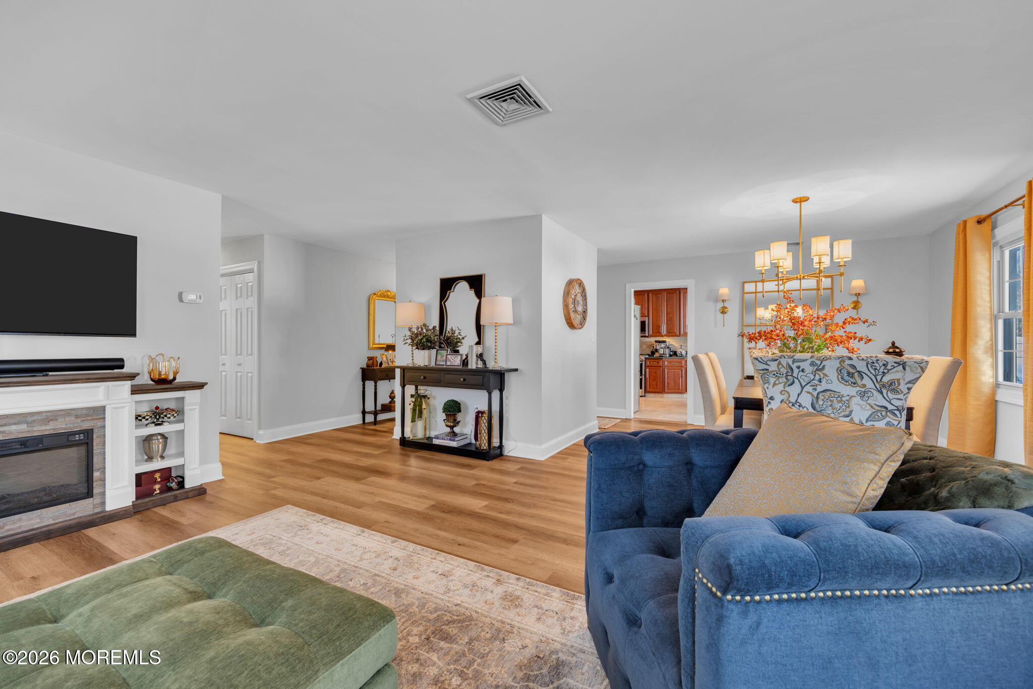 17 Idlebrook Lane Aberdeen, NJ 07747 - Photo 11 of 52 a living room with furniture and a flat screen tv