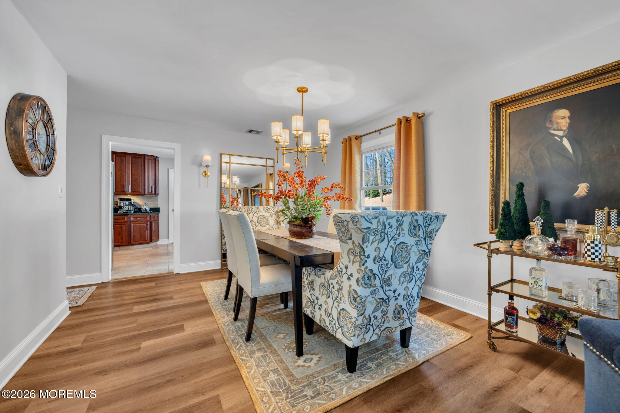 17 Idlebrook Lane Aberdeen, NJ 07747 - Photo 15 of 52 a dining room with furniture a rug a painting and a chandelier