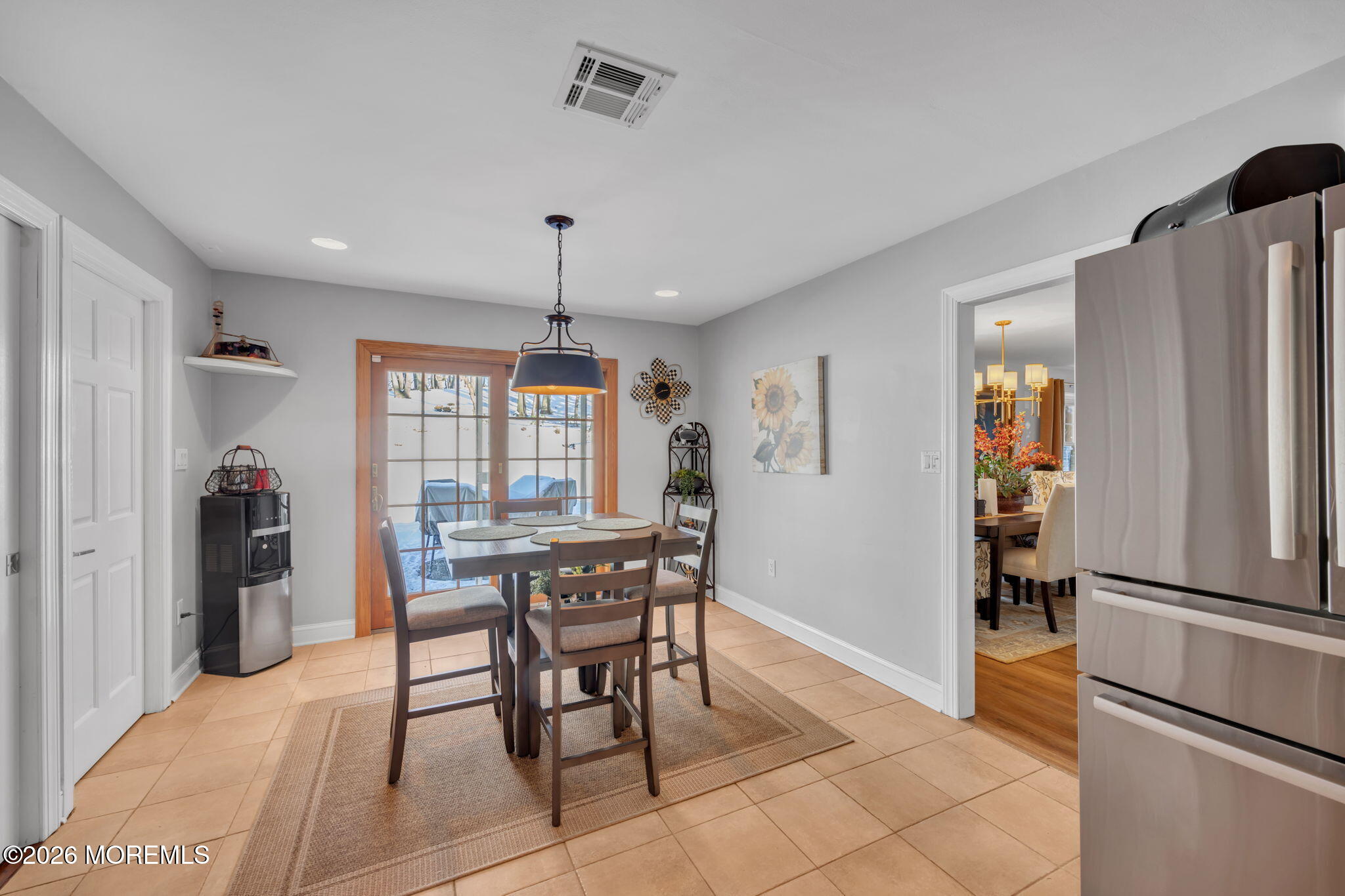 17 Idlebrook Lane Aberdeen, NJ 07747 - Photo 18 of 52 a view of a dining room with furniture window and wooden floor