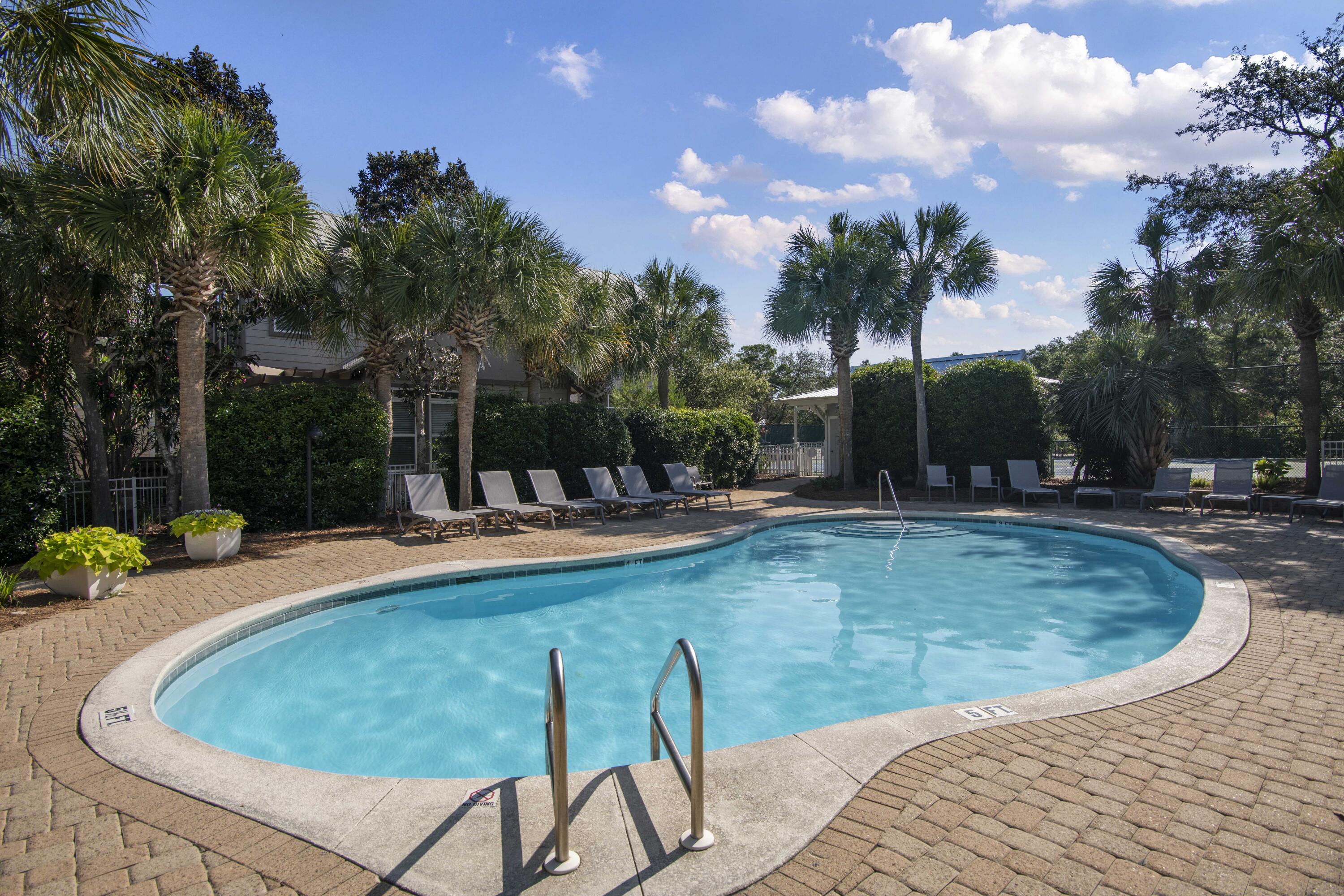 78 North Myrtle Drive, Unit 111 Santa Rosa Beach, FL 32459 - Photo 16 of 21 a view of a swimming pool with a patio and dining space