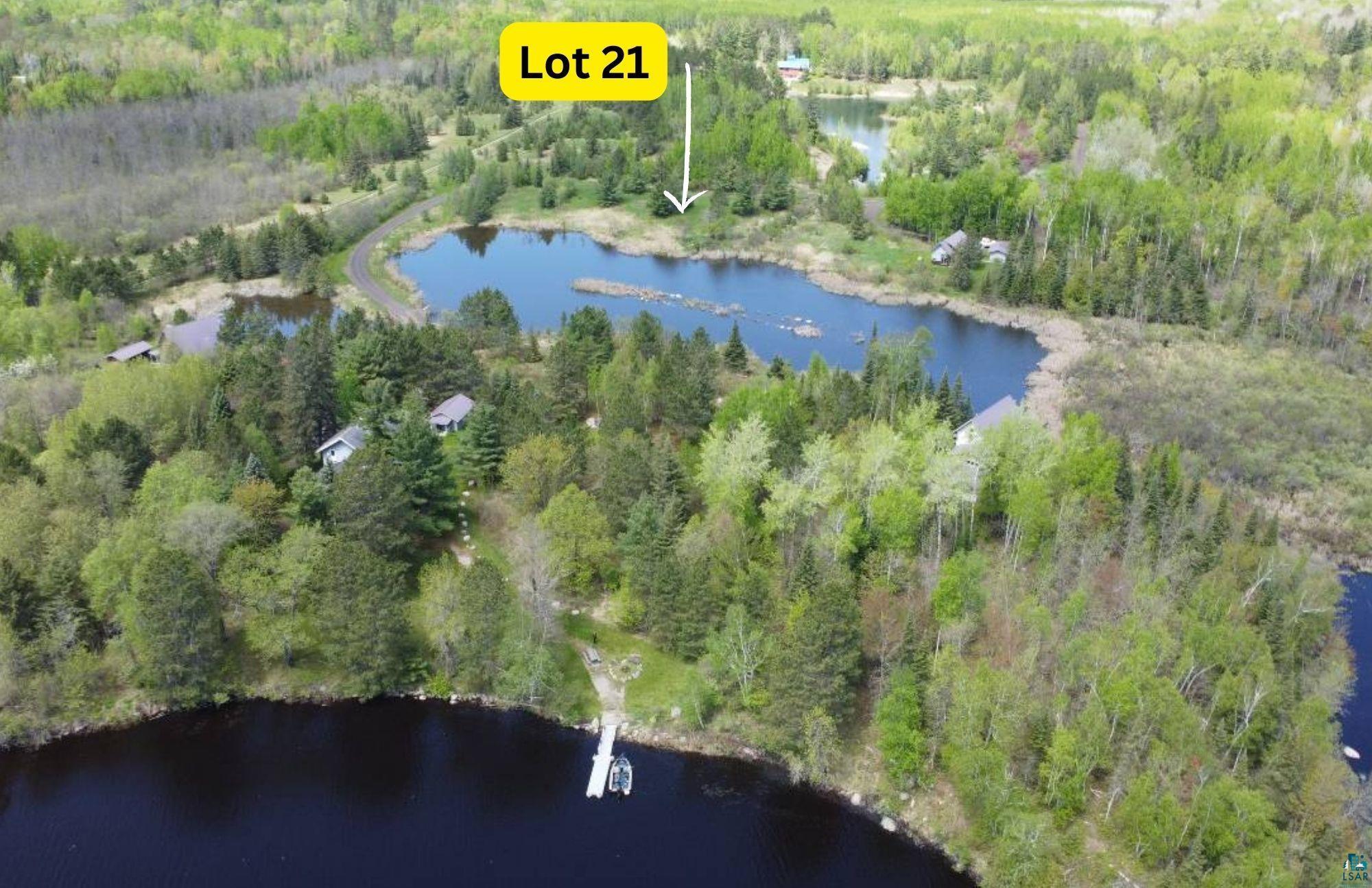 80048 Waters Of Vermilion Road Tower, MN 55790 - Photo 2 of 47 Birds eye view of property featuring a wooded view and a water view