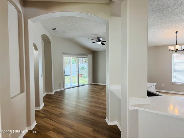 a view of livingroom with furniture and wooden floor