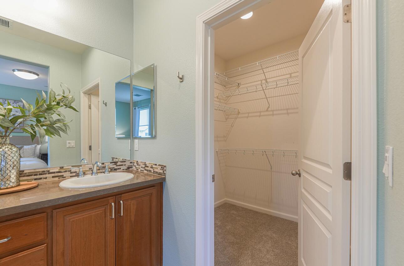 145 Atherton Loop Aptos, CA 95003 - Photo 28 of 47 a bathroom with a sink and a mirror