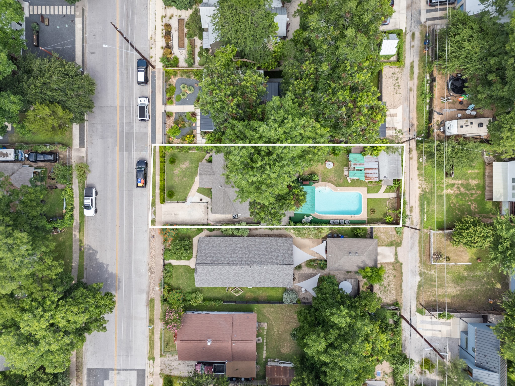 1908 Holly Street Austin, TX 78702 - Photo 19 of 22 An aerial perspective reveals a vibrant backyard oasis complete with a refreshing pool.