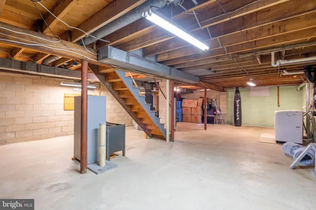 a view of a backyard with large trees