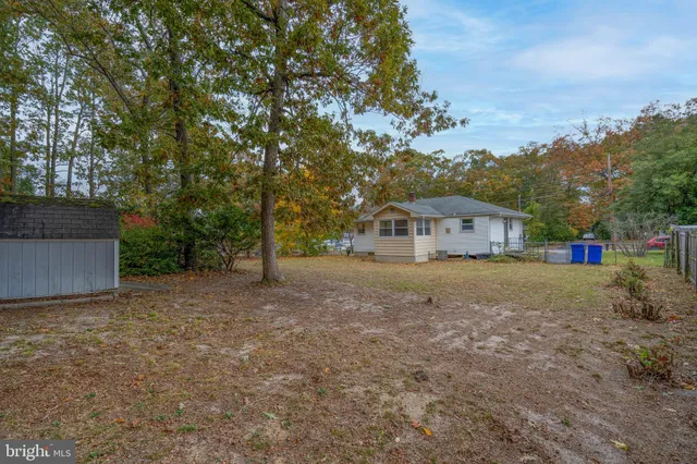 a house view with a garden space