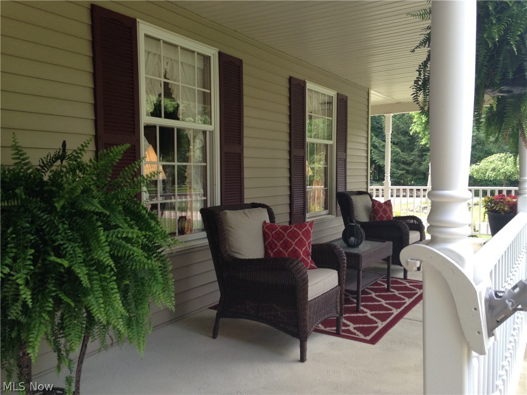 6739 Stoney Ridge Road North Ridgeville, OH 44039 - Photo 4 of 32 Beautiful wide covered front porch - all redone.