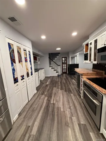 a view of an outdoor space with furniture window