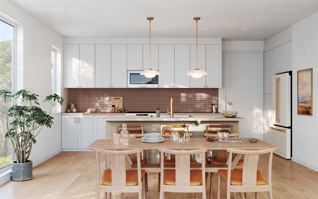 3530 Gonzales Street, Unit B Austin, TX 78702 - Photo 2 of 7 Kitchen featuring high end finishes, LG STUDIO appliances, premium quartz countertops, and artisan tile