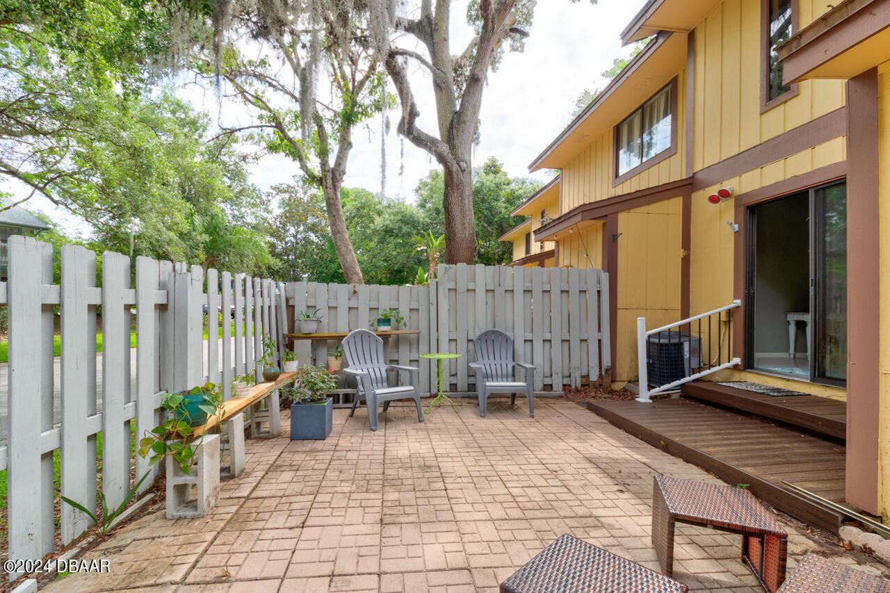 13 Glen Arbor Park Ormond Beach, FL 32174 - Photo 20 of 35 a view of outdoor space with deck and furniture