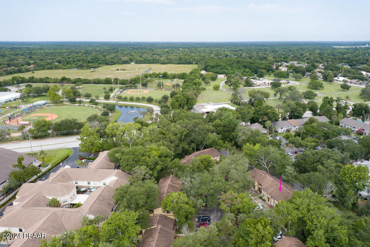13 Glen Arbor Park Ormond Beach, FL 32174 - Photo 29 of 35 an aerial view of residential houses with outdoor space and trees