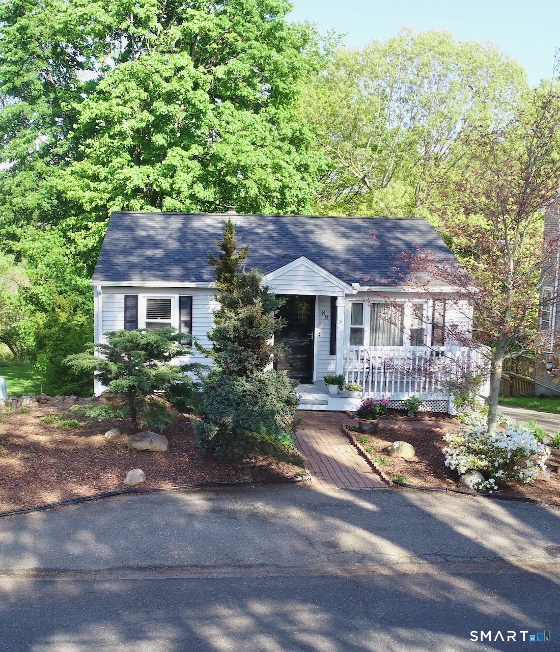 88 Avery Avenue Meriden, CT 06450 - Photo 1 of 31 a front view of house with yard and trees in the background