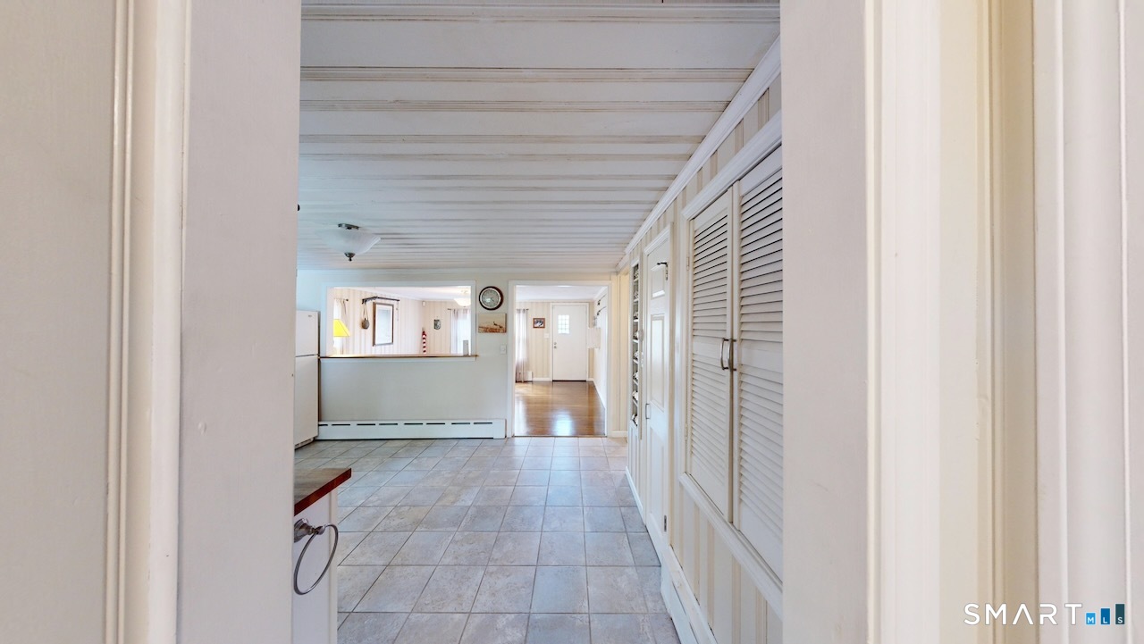 88 Avery Avenue Meriden, CT 06450 - Photo 18 of 31 a view of a closet area with living room