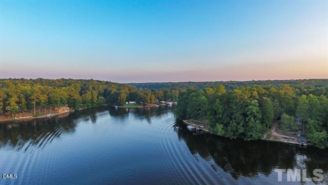 111 Miami Lane Spring Hope, NC 27882 - Photo 6 of 10 a view of a lake with sunset