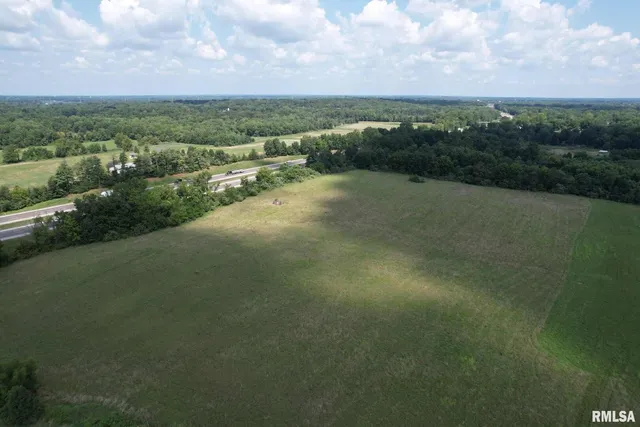 a view of a lake with a city