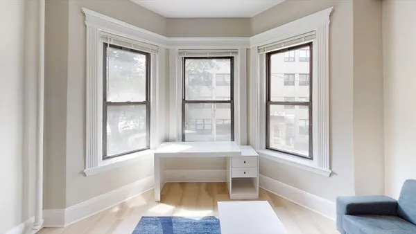 a bathroom with a toilet a sink and a bathtub