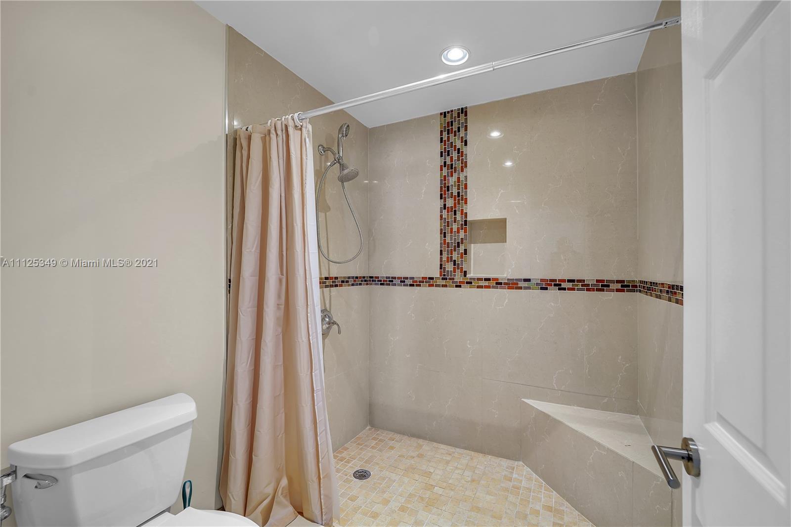 The Crossings Miami, FL 33186 - Photo 23 of 31 a bathroom with a shower and a toilet