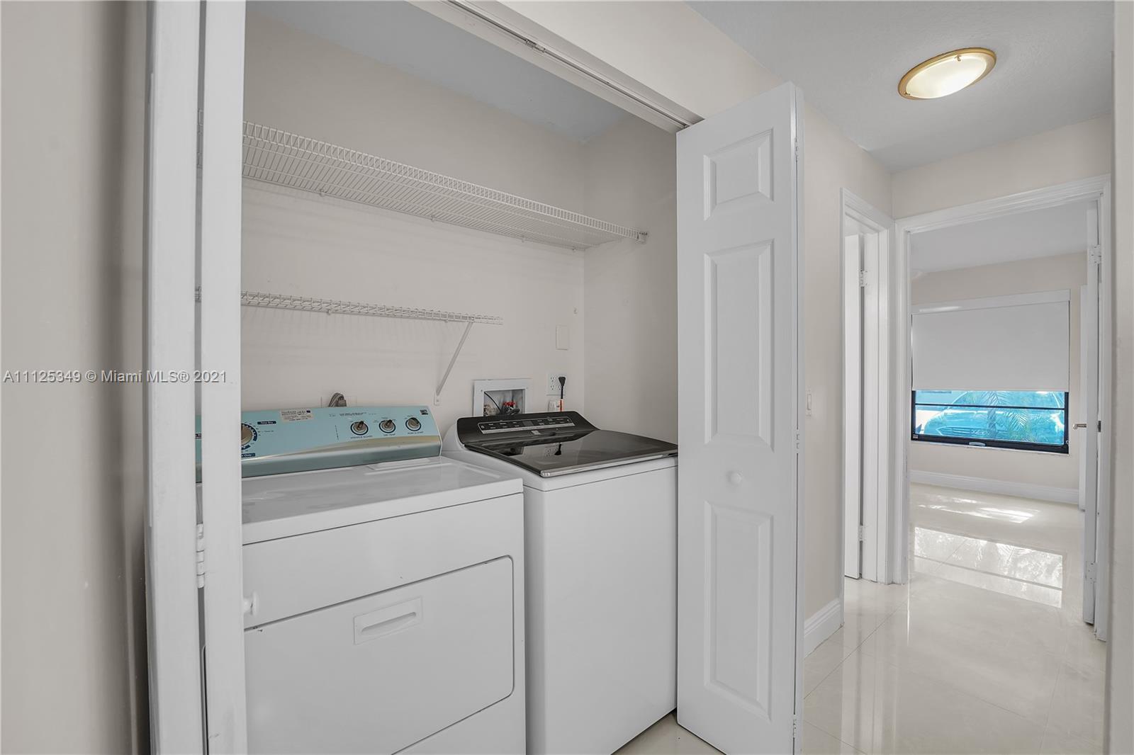 The Crossings Miami, FL 33186 - Photo 26 of 31 a kitchen with a stove and a refrigerator