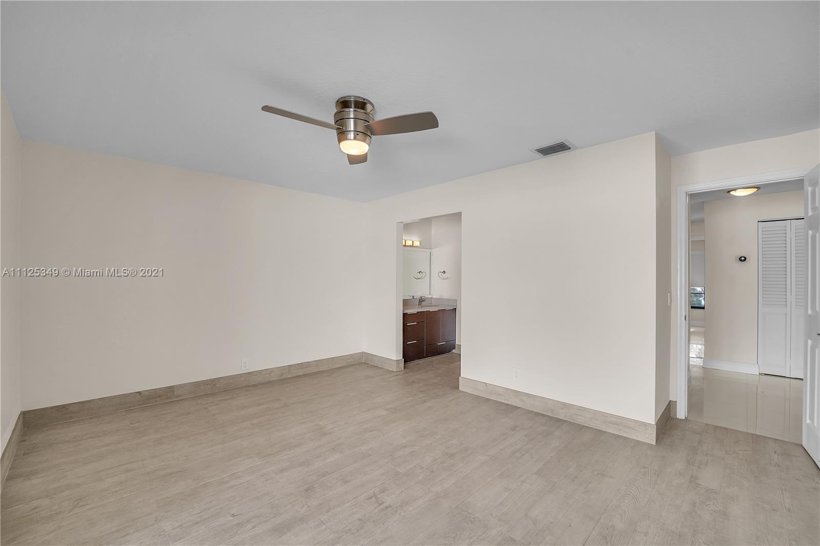 The Crossings Miami, FL 33186 - Photo 8 of 31 an empty room with a bathroom