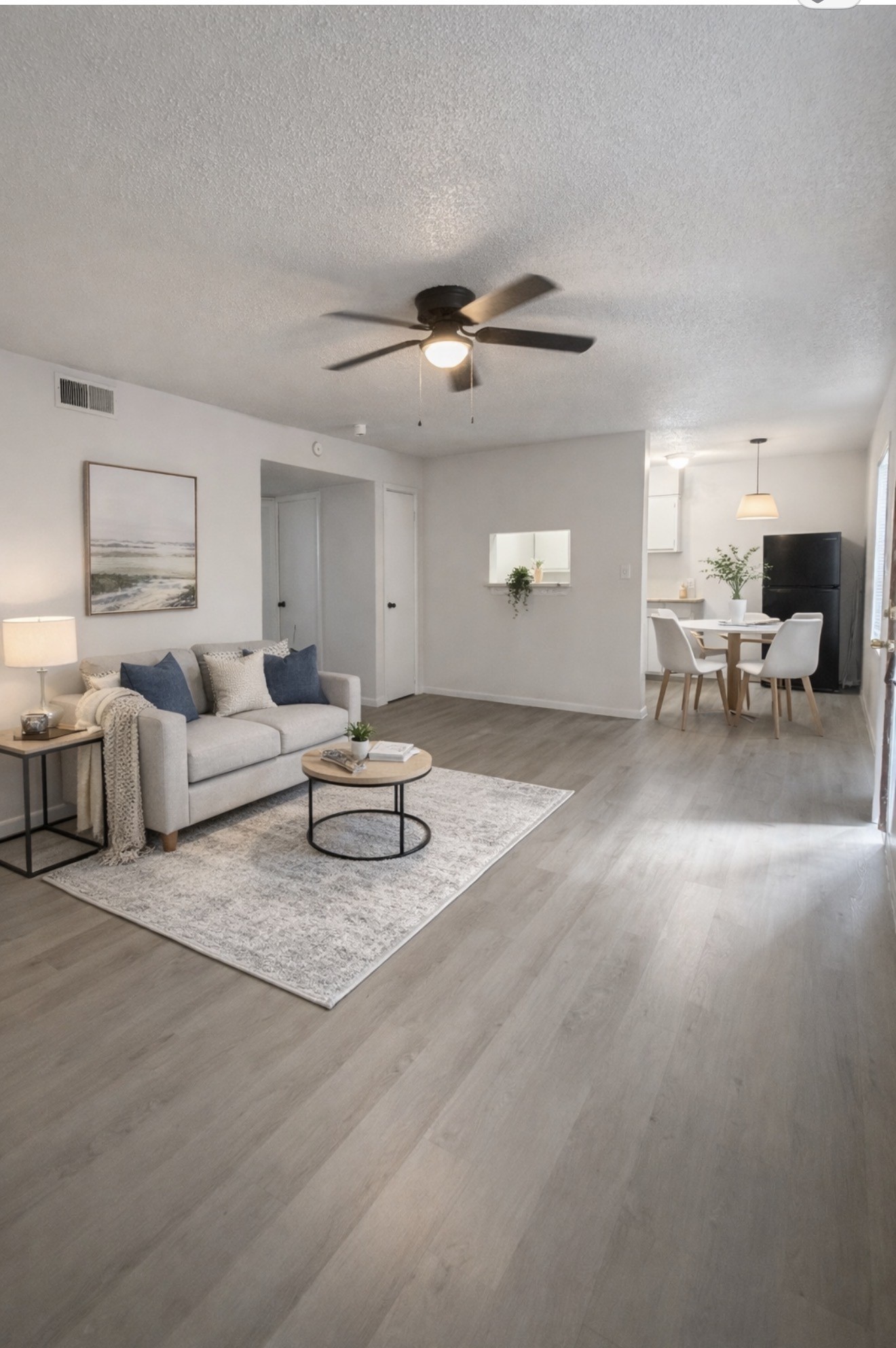 1614 Vauthier Street, Unit 3 La Marque, TX 77568 - Photo 1 of 13 a living room with furniture and a chandelier