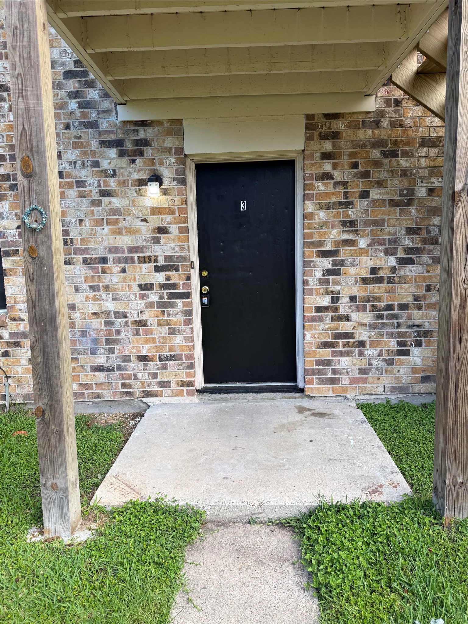 1614 Vauthier Street, Unit 3 La Marque, TX 77568 - Photo 2 of 13 a front view of a house with a yard