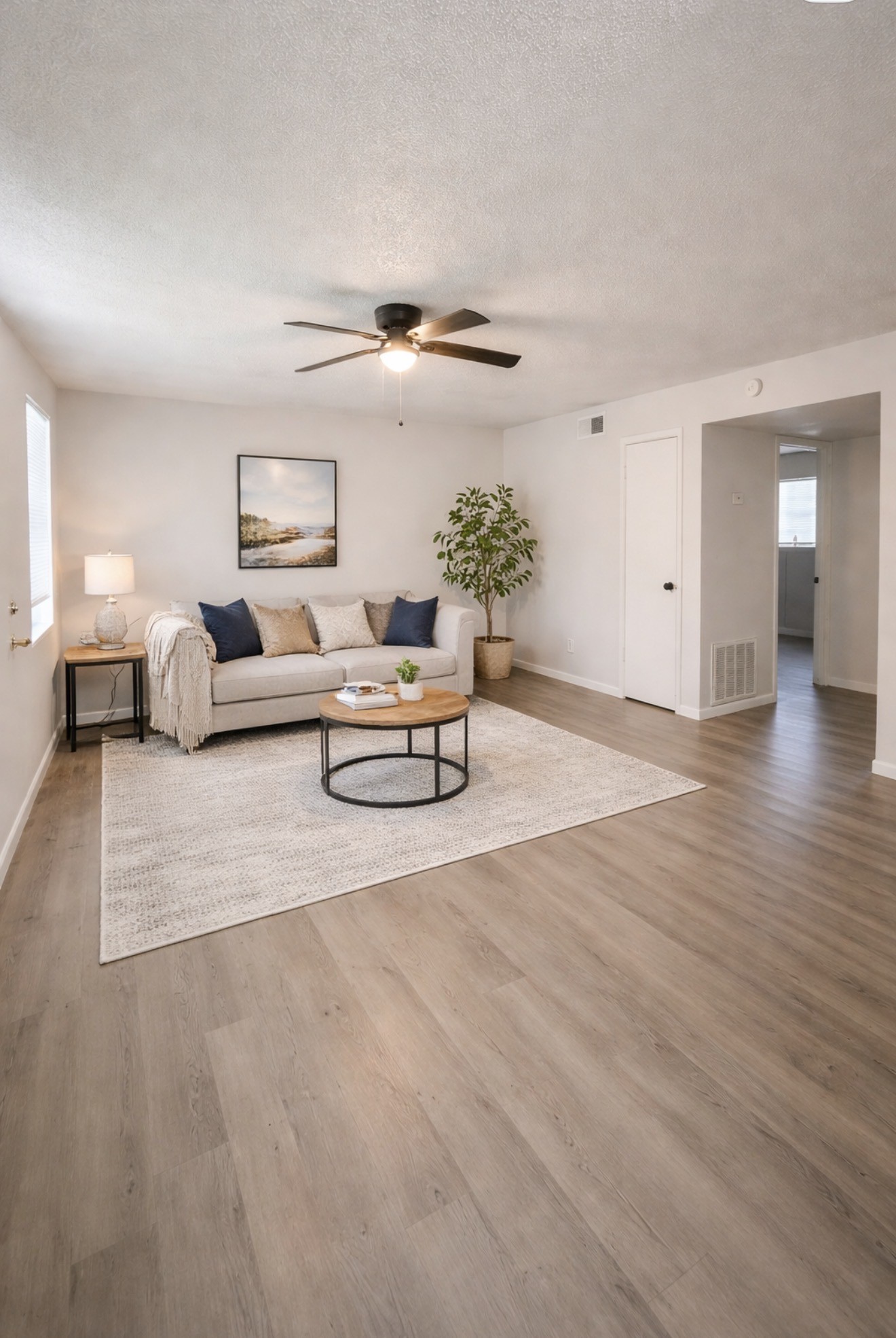1614 Vauthier Street, Unit 3 La Marque, TX 77568 - Photo 3 of 13 a living room with furniture and a wooden floor