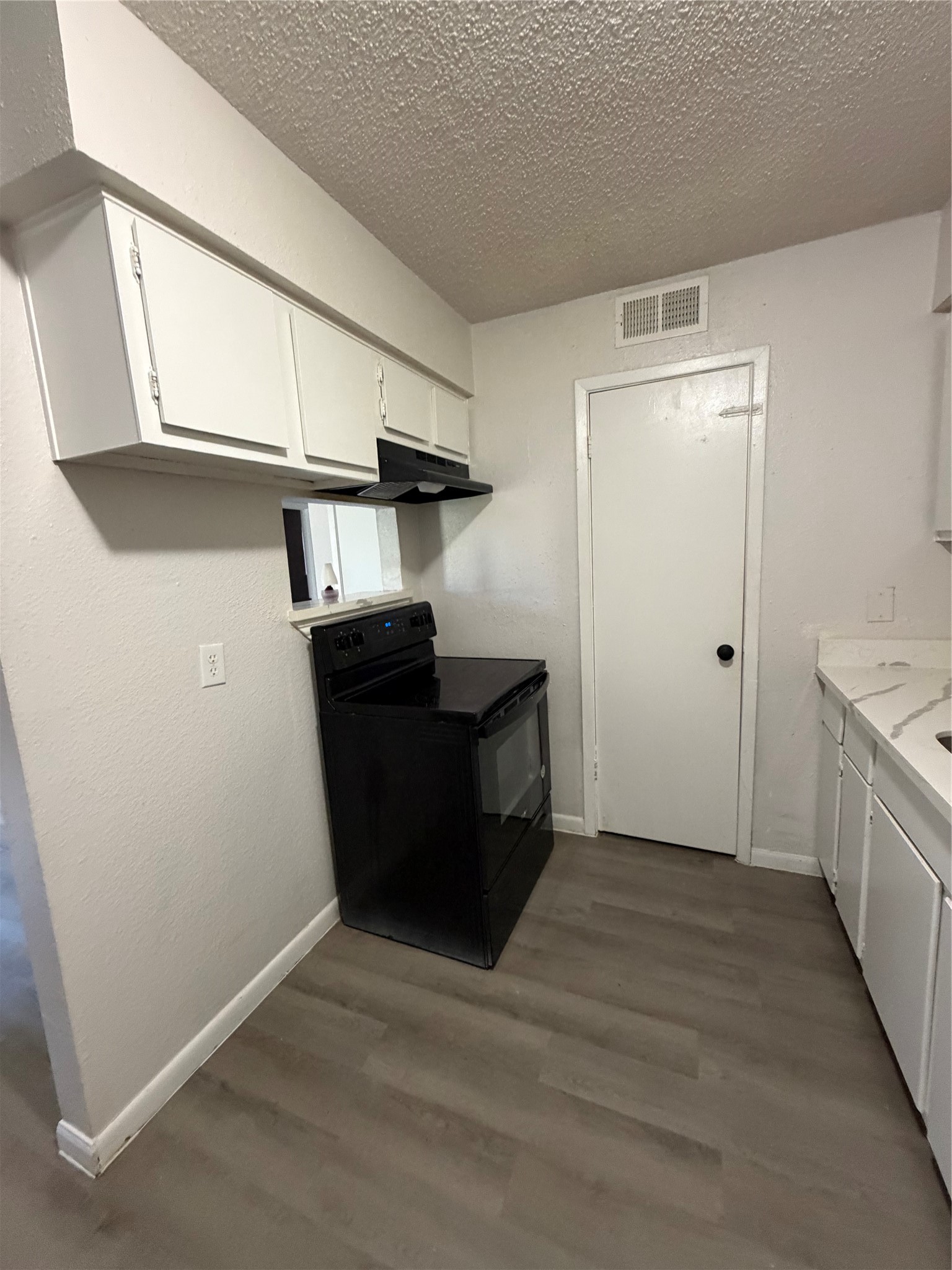 1614 Vauthier Street, Unit 3 La Marque, TX 77568 - Photo 6 of 13 a view of empty room with wooden floor