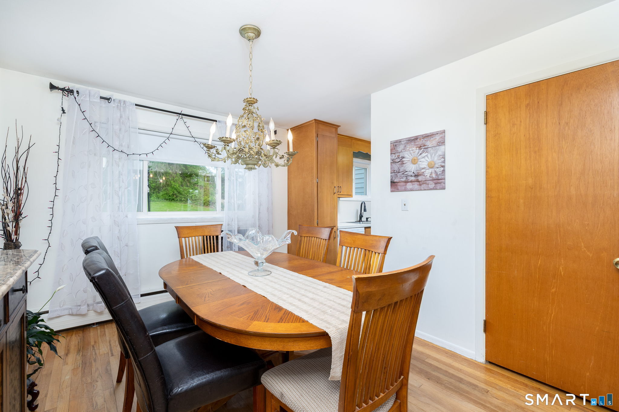 325 Barbara Road Middletown, CT 06457 - Photo 14 of 40 a view of a dining room with furniture and window