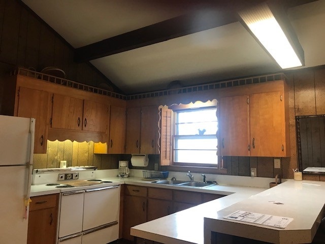 10331 Rooster Ridge Lane Dayton, VA 22821 - Photo 4 of 17 a kitchen with a sink a stove a refrigerator and cabinets