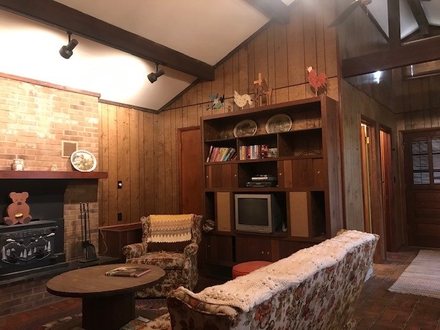 10331 Rooster Ridge Lane Dayton, VA 22821 - Photo 6 of 17 a living room with furniture a rug and a fireplace