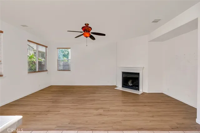 a kitchen with stainless steel appliances a sink stove and cabinets