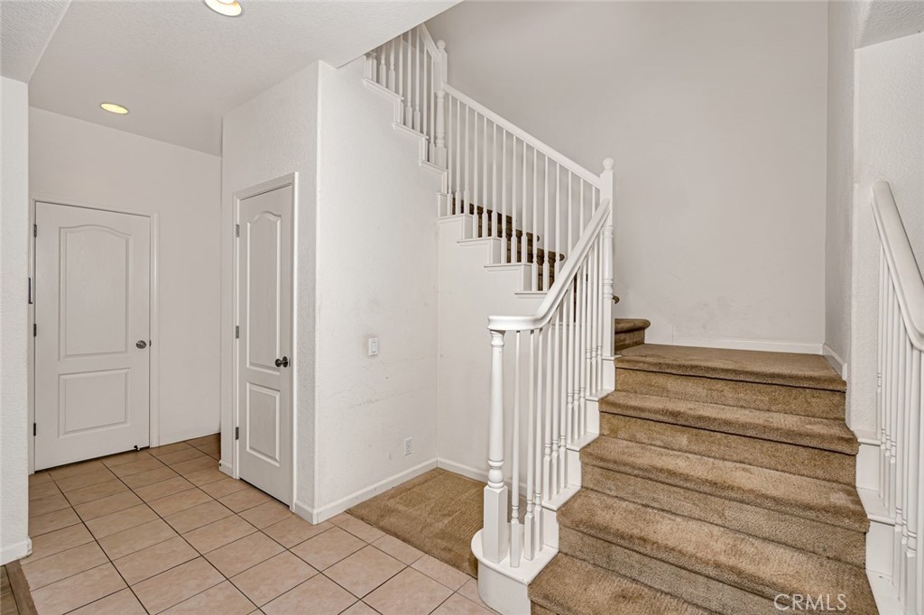 1289 Verdon Court Merced, CA 95348 - Photo 25 of 56 a view of entryway and hall with wooden floor