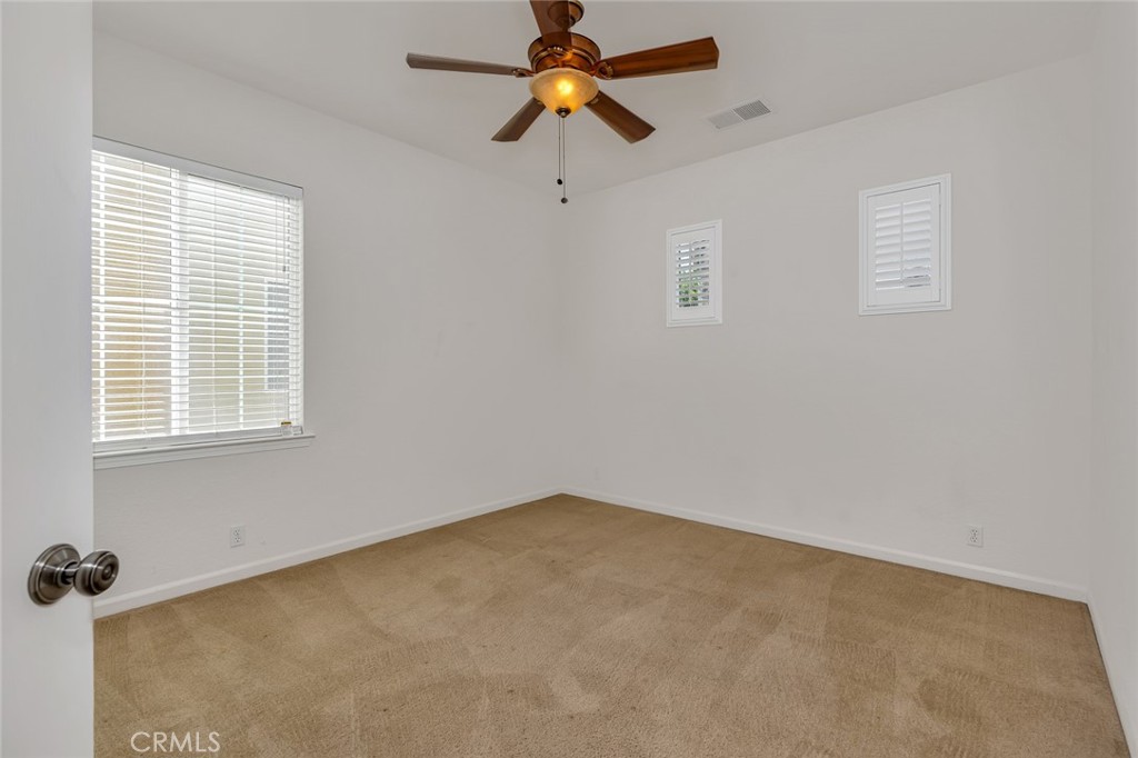 1289 Verdon Court Merced, CA 95348 - Photo 29 of 56 a view of a workspace with a window