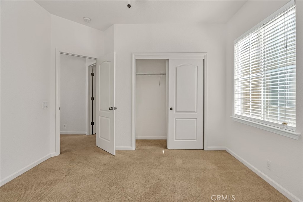 1289 Verdon Court Merced, CA 95348 - Photo 30 of 56 a view of an empty room with a window