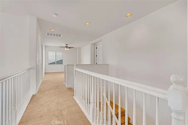 a bathroom with a toilet and a bathtub
