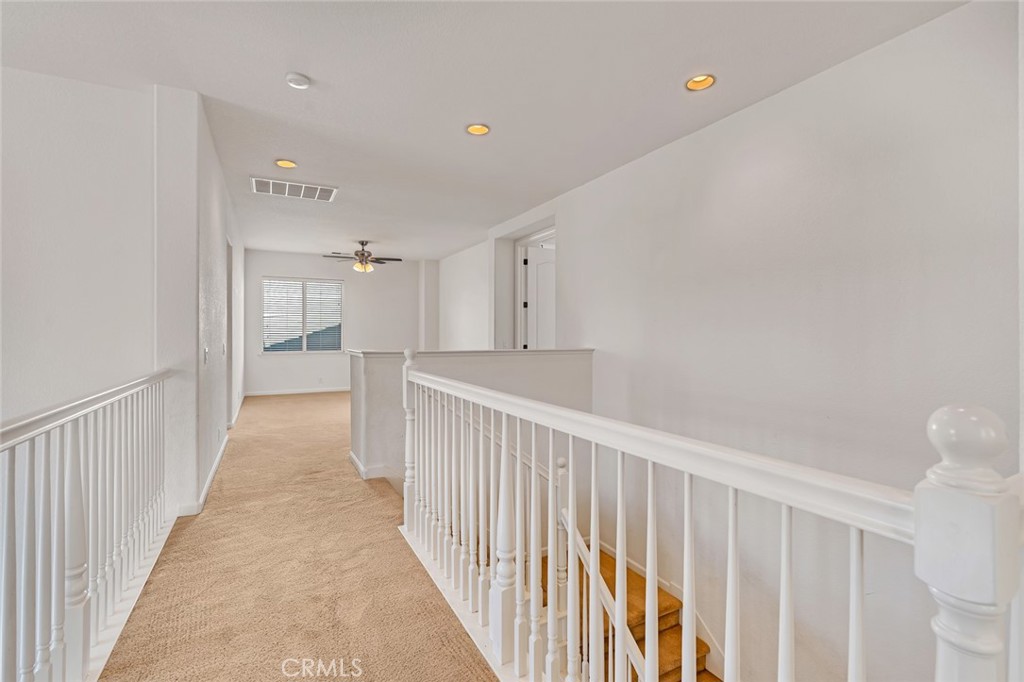 1289 Verdon Court Merced, CA 95348 - Photo 33 of 56 a view of a hallway with a bathroom