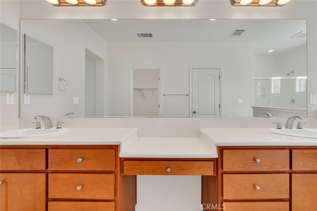 1289 Verdon Court Merced, CA 95348 - Photo 47 of 56 a bathroom with a sink and a mirror