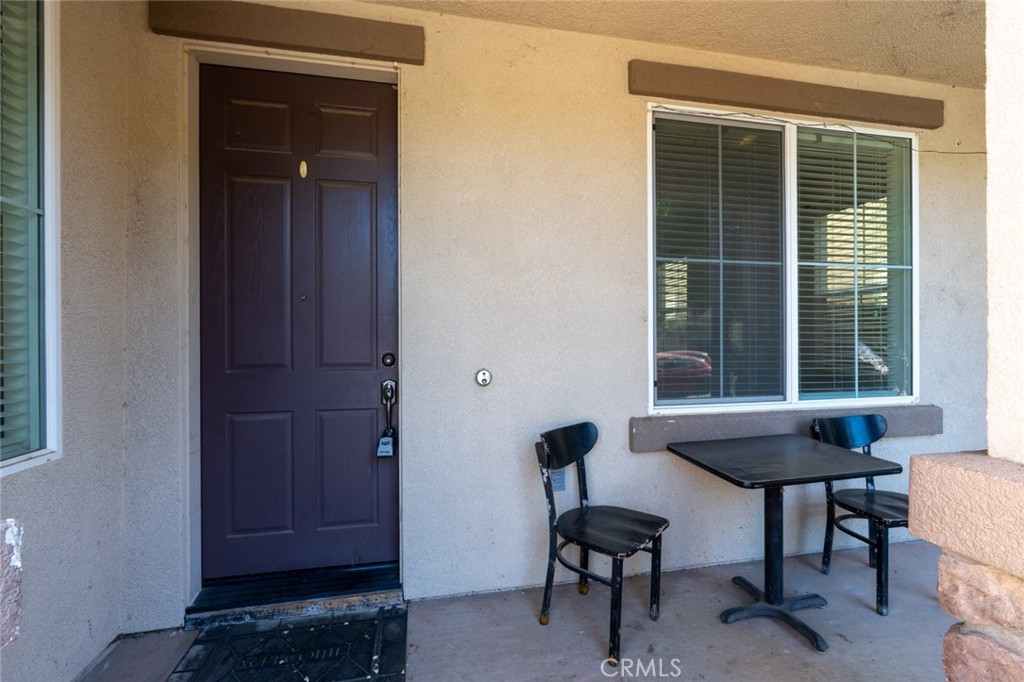 1289 Verdon Court Merced, CA 95348 - Photo 6 of 56 a view of a livingroom with furniture and a window