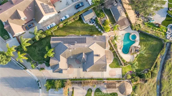 a view of a swimming pool with a lounge chairs