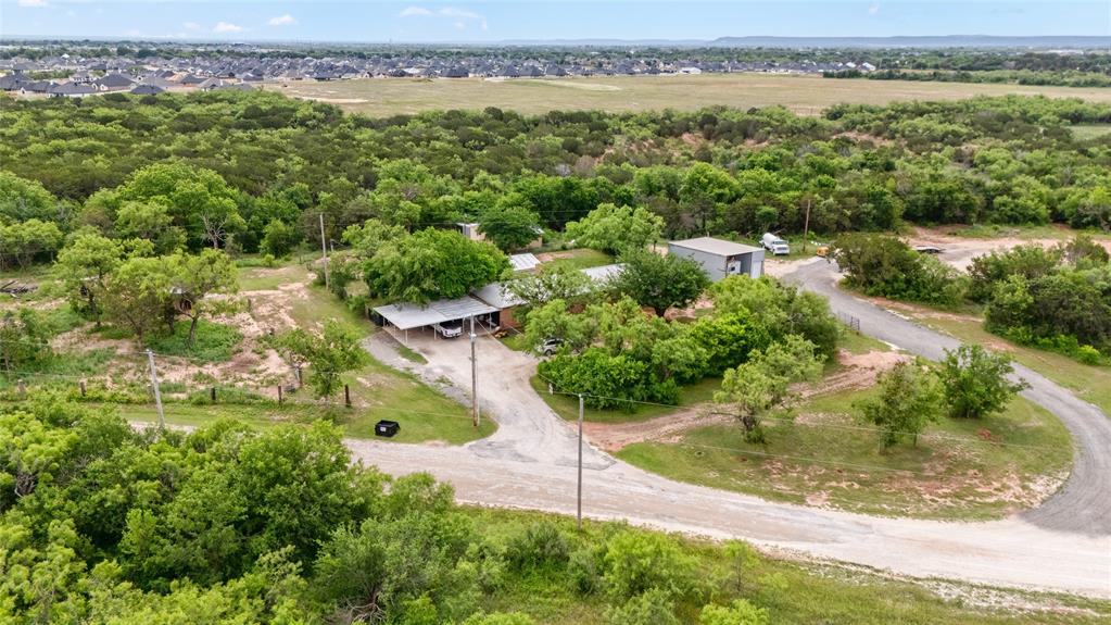 117 Buchanan Road Abilene, TX 79606 - Photo 6 of 40 an aerial view of a residential houses with outdoor space and trees