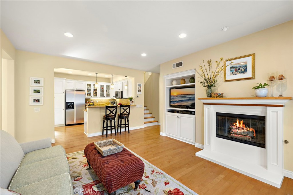 8 Earthen Court Ladera Ranch, CA 92694 - Photo 13 of 58 a living room with furniture and a fireplace