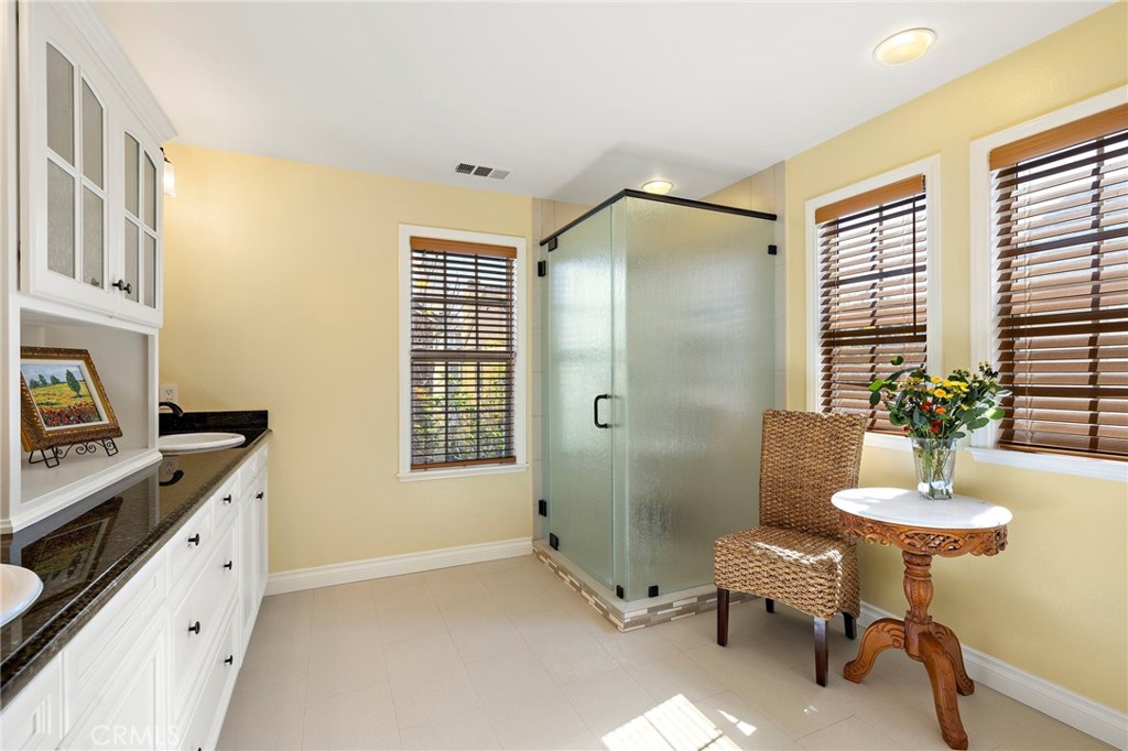 8 Earthen Court Ladera Ranch, CA 92694 - Photo 20 of 58 a bathroom with a sink toilet and shower