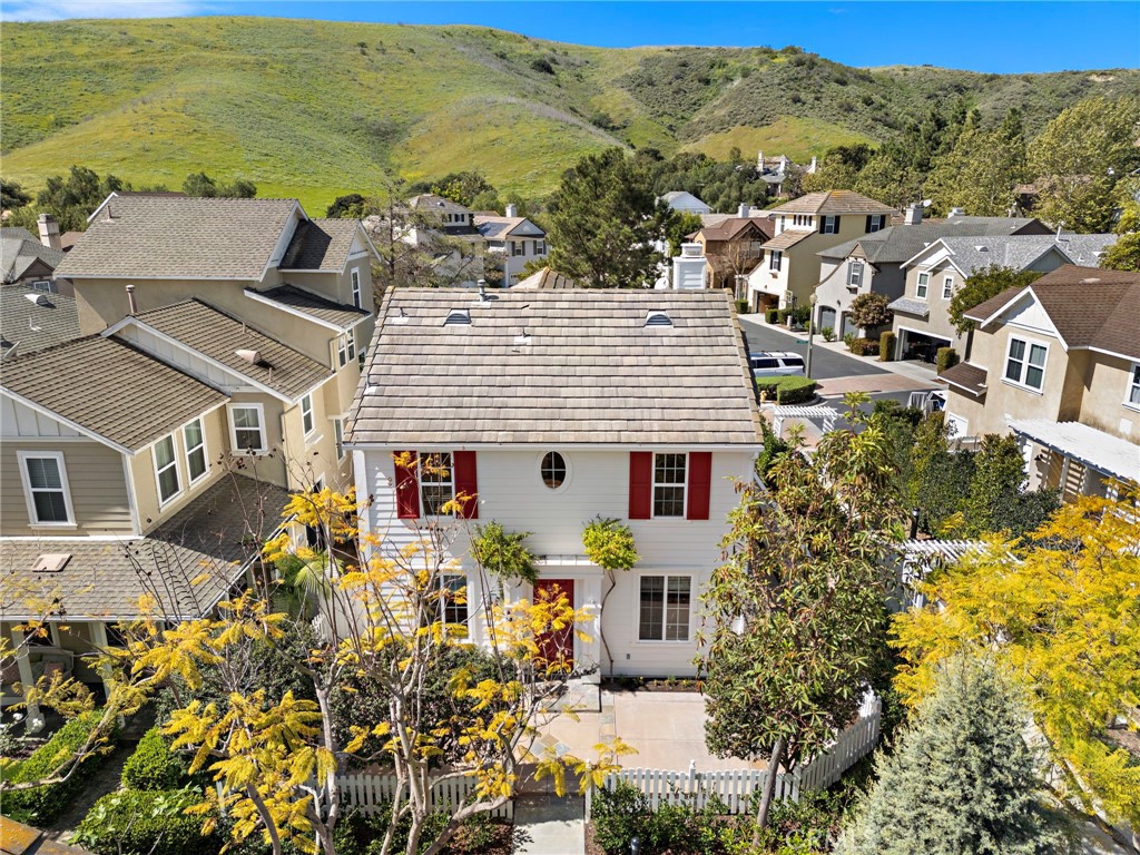 8 Earthen Court Ladera Ranch, CA 92694 - Photo 2 of 58 an aerial view of residential houses with outdoor space and ocean view
