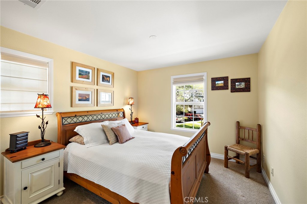 8 Earthen Court Ladera Ranch, CA 92694 - Photo 27 of 58 a bedroom with a bed and wooden floor