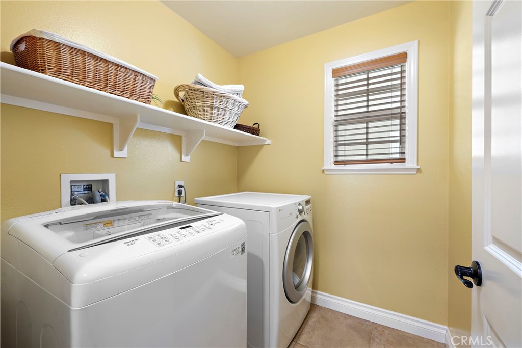 8 Earthen Court Ladera Ranch, CA 92694 - Photo 29 of 58 a utility room with dryer and washer