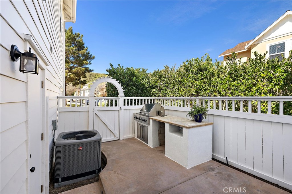 8 Earthen Court Ladera Ranch, CA 92694 - Photo 31 of 58 a view of a chairs and table in the terrace